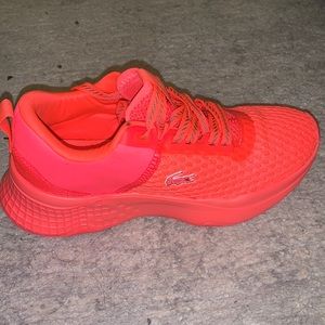 Red Lacoste sneakers